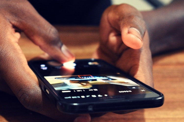 A person interacts with a smartphone app
